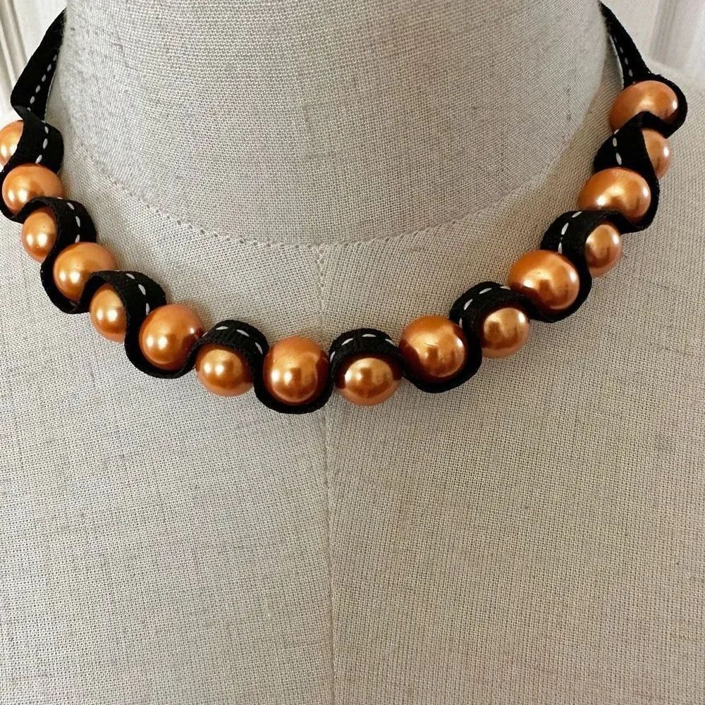 Orange beaded black ribbon necklace